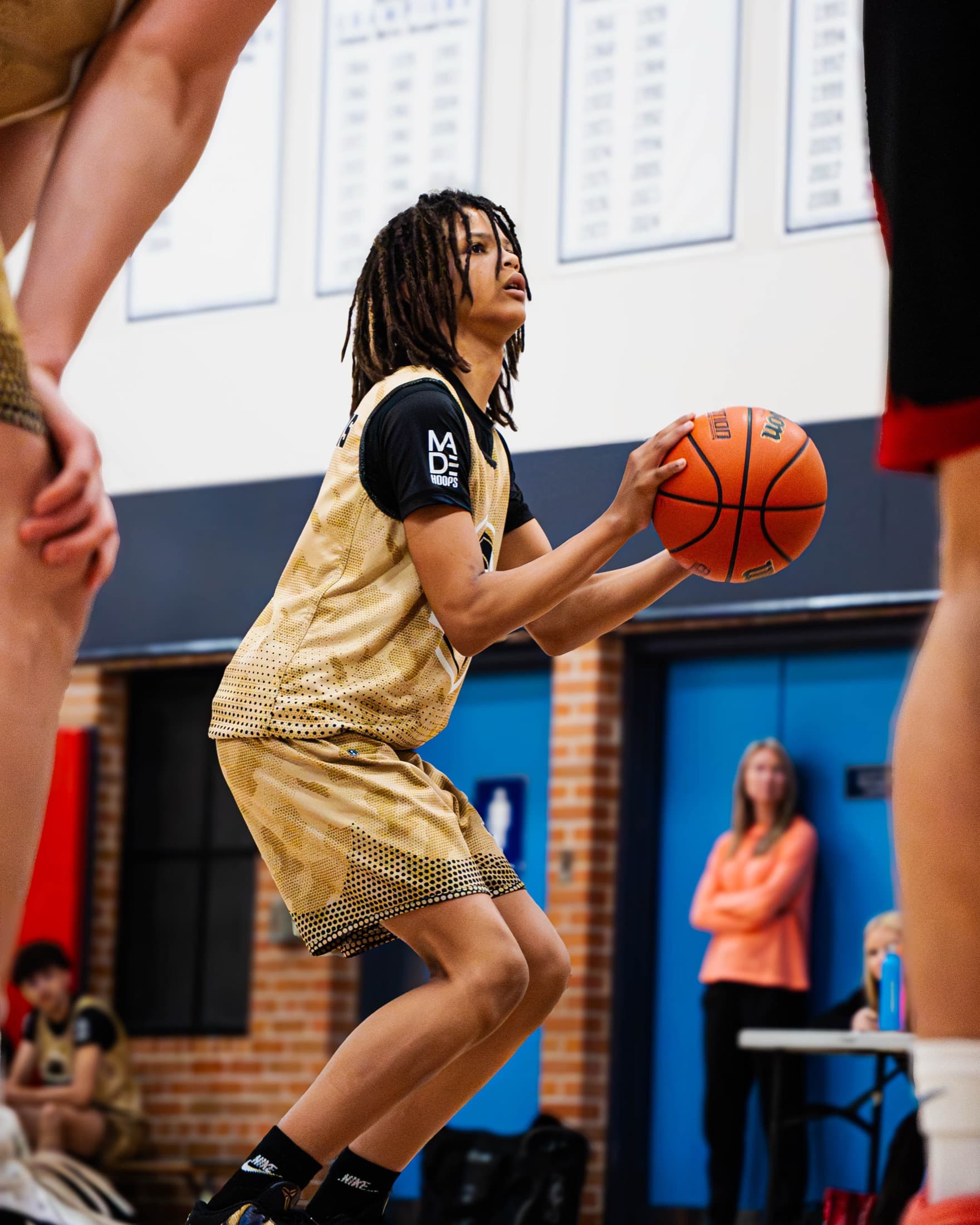 A player leaping to make a pass